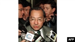 (FILES) US ambassador to Bolivia Manuel Rocha talks to the press on July 11, 2001.