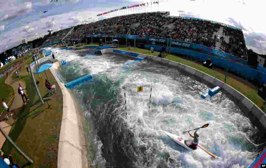 Germany's Jasmin Schornberg competes in the women's K-1 kayak slalom heats at the Lee Valley White Water Center.