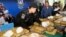 FILE - Thai policemen arrange packages of confiscated methamphetamine on a table before a press conference in Bangkok, Thailand, Feb. 15, 2013.