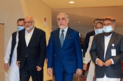 Abdullah Abdullah, the chairman of Afghanistan's High Council for National Reconciliation, arrives for Afghan peace talks in Doha, Qatar, Aug. 12, 2021.