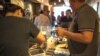 Falafel Inc. is crowded with customers during lunch hour. (J. Soh/VOA)