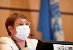 FILE - U.N. High Commissioner for Human Rights Michelle Bachelet attends the 44th session of the Human Rights Council at the European headquarters of the United Nations in Geneva, Switzerland, June 30, 2020.