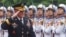 U.S. Chairman of the Joint Chiefs of Staff General Martin Dempsey reviews the honor guard during a welcoming ceremony in Hanoi, Aug. 14, 2014.