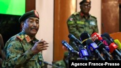Sudan's top army general Abdel Fattah al-Burhan speaks during a press conference at the General Command of the Armed Forces in Khartoum on Oct. 26, 2021.