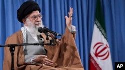 In this picture released by an official website of the office of the Iranian supreme leader, Ayatollah Ali Khamenei speaks at a meeting with a group of Revolutionary Guards and their families, in Tehran, Iran, April 9, 2019.