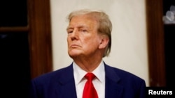 FILE - Republican presidential candidate and former U.S. President Donald Trump at his Trump International Golf Club in West Palm Beach on March 24, 2024.