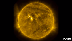 Solar activity is seen in a screenshot of a NASA video.