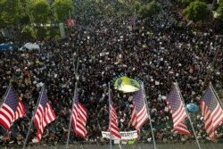 Demonstrators take part in a protest over the death of George Floyd who died May 25 after he was restrained by Minneapolis police, June 3, 2020, in downtown Los Angeles.