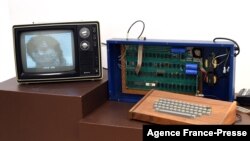 A press preview at Christie’s on Dec. 5, 2014 displays ‘The Ricketts’ Apple-1 Personal Computer, as part of the auction house’s inaugural Exceptional Sale in New York, taking place on Dec. 11 at Rockefeller Center.