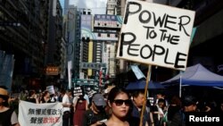 Pro-democracy activists take part in a protest on China's National Day in Hong Kong, China, Oct. 1, 2017. 