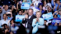 Democratic presidential candidate Hillary Clinton appears with running mate Sen. Tim Kaine, D-Va., at a rally at Florida International University in Miami, July 23, 2016. 