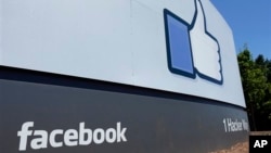 A sign at Facebook headquarters in Menlo Park, California, July 2013.