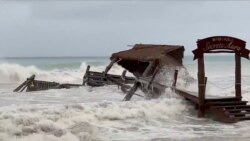 A pier is washed away by Tropical Storm Gamma in Cozumel, Mexico, Octo. 3, 2020, in this still image from video obtained via social media. (@The_Klute via Reuters)