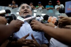 Bolivian former president and presidential candidate Carlos Mesa attends a news conference in Santa Cruz, Bolivia, Oct. 29, 2019.