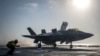 A U.S. Navy handout photo of an F-35B Lightning II aircraft launched aboard the amphibious assault ship USS Essex as part of the F-35B's first combat strike, against a Taliban target in Afghanistan, July 23, 2021.