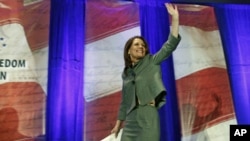 US Representative Michele Bachmann arrives to speak at the Faith & Freedom Conference and Strategy Briefing in Washington, DC, June 3, 2011