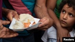 Faces in the Crowd: The Honduran Caravan