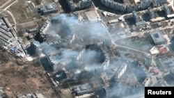 Picha za satellite zinaonyesha majengo yakiteketea Mariupol (Picha na Reuters).