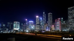 FILE - An evening view of the financial Central district in Hong Kong, China, Nov. 23, 2017.