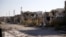 FILE - Destroyed buildings are seen in the city of Ramadi, January 16, 2016. Ramadi was freed of IS extremists in December 2015 after a fierce battle and more than 600 bombings left much of the city in ruins, 100 kilometers west of the capital, Baghdad.