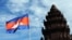 FILE - Cambodian flag flies at Independent Monument, Phnom Penh.