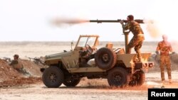 Members of the Shi'ite Badr Organization undergo training before the upcoming battle to recapture Mosul in Diyala province, Iraq, Sept. 27, 2016.