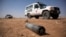 FILE - An unexploded ordnance is seen in North Darfur, March 27, 2011. 