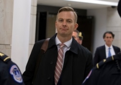 David Holmes, a career diplomat and the political counselor at the U.S. Embassy in Ukraine leaves Capitol Hill, Nov. 15, 2019, in Washington, after a deposition before lawmakers.