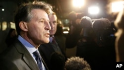 IAAF President Sebastian Coe gives a statement to journalists outside his office in London, Nov. 13, 2015.