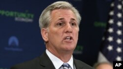 FILE - House Majority Leader Kevin McCarthy of California talks during a news conference on Capitol Hill, Washington.