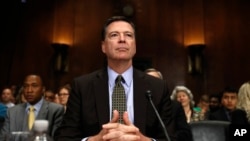 FBI Director James Comey prepares to testify on Capitol Hill in Washington, May 3, 2017, before the Senate Judiciary Committee hearing: "Oversight of the Federal Bureau of Investigation." 