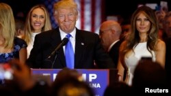 Republican presidential candidate Donald Trump smiles as he speaks at the start of a campaign victory party after Senator Ted Cruz dropped out of the race for the Republican presidential nomination. Ohio Governor John Kaisich also dropped out, leaving him the only Republican candidate standing. 