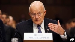 Director of the National Intelligence James Clapper testifies on Capitol Hill in Washington, Feb. 9, 2016.