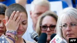 Marjory Stoneman Douglas High School student Emma Gonzalez reacts during her speech at a rally for gun control at the U.S. Courthouse in Fort Lauderdale, Fla., Feb. 17, 2018.