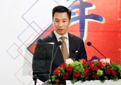FILE - Alex Wong, U.S. deputy assistant secretary of state, delivers a speech during the 2018 Hsieh Nien Fan of the American Chamber of Commerce in Taipei, Taiwan, March 21, 2018.