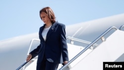 FILE - US Vice President Kamala Harris descends from Air Force Two at Newport News/Williamsburg International Airport, in Newport News, Virginia, Sept. 10, 2021.