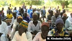 FILE - Parents listen as education officials encourage them to enroll their children school, in Ashigashia, Cameroon, April 15, 2019. (Moki Kindzeka/VOA) 