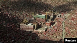 FILE - A view of the settlements of Larung Gar Buddhist Academy in Sertar County of Ganze Tibetan Autonomous Prefecture, Sichuan province, China, July 23, 2015. 