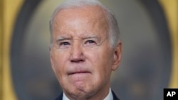 U.S. President Joe Biden speaks in the Diplomatic Reception Room of the White House on Feb. 8, 2024, in Washington.