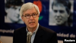 FILE - Gert Kuiper, brother of Jan Kuiper, one of four Dutch journalists killed in 1982, speaks during a news conference in San Salvador, El Salvador, March 17, 2022.