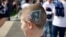 A young New England Patriots fan sports his team's logo painted in his hair at the Super Bowl in Houston, Texas. (B. Allen/VOA)