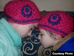 Nour and Alaa embrace in Eastern Ghouta, March 12, 2018.