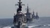 Ілюстративне фото: корабель Японських морських сил самооборони Kurama очолює формацію з інших суден під час заходу біля затоки Сагамі, на південь від Токіо, 15 жовтня 2015 р. Фото: AP Photo/Koji Ueda