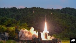 In this photo provided by South Korea Defense Ministry, a Hyunmoo II ballistic missile is fired during an exercise at an undisclosed location, Sept. 4, 2017. 