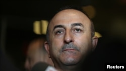 FILE - Turkish Foreign Minister Mevlut Cavusoglu speaks to reporters after the U.N. General Assembly emergency special session on U.S. President Donald Trump's decision to recognize Jerusalem as Israel's capital in Manhattan, New York, U.S., Dec. 21, 2017