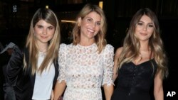 Actress Lori Loughlin, center, is seen with her daughters Isabella Rose Giannulli and Olivia Jade Giannulli in Los Angeles, Calif. 