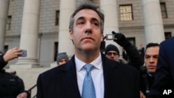 FILE - Michael Cohen walks out of federal court Nov. 29, 2018, in New York, after pleading guilty to lying to Congress about work he did on an aborted project to build a Trump Tower in Russia. 