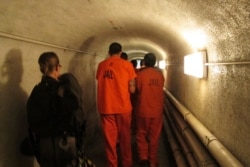 File — Almost one-fourth of unemployed US men born between 1960 and 1964, don't work because they are in prison, according to the U.S. Bureau of Labor Statistics.