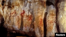 Neanderthal paintings can be seen in a cave in Pasiega, Spain in this photo obtained Feb. 22, 2018. University of Southampton. 
