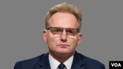 FILE - Thomas Modly resigned his post as acting secretary of the Navy Tuesday "on his own accord."